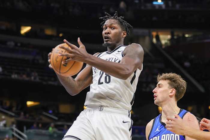 Brooklyn Nets forward Dorian Finney-Smith (28) grabs a rebound